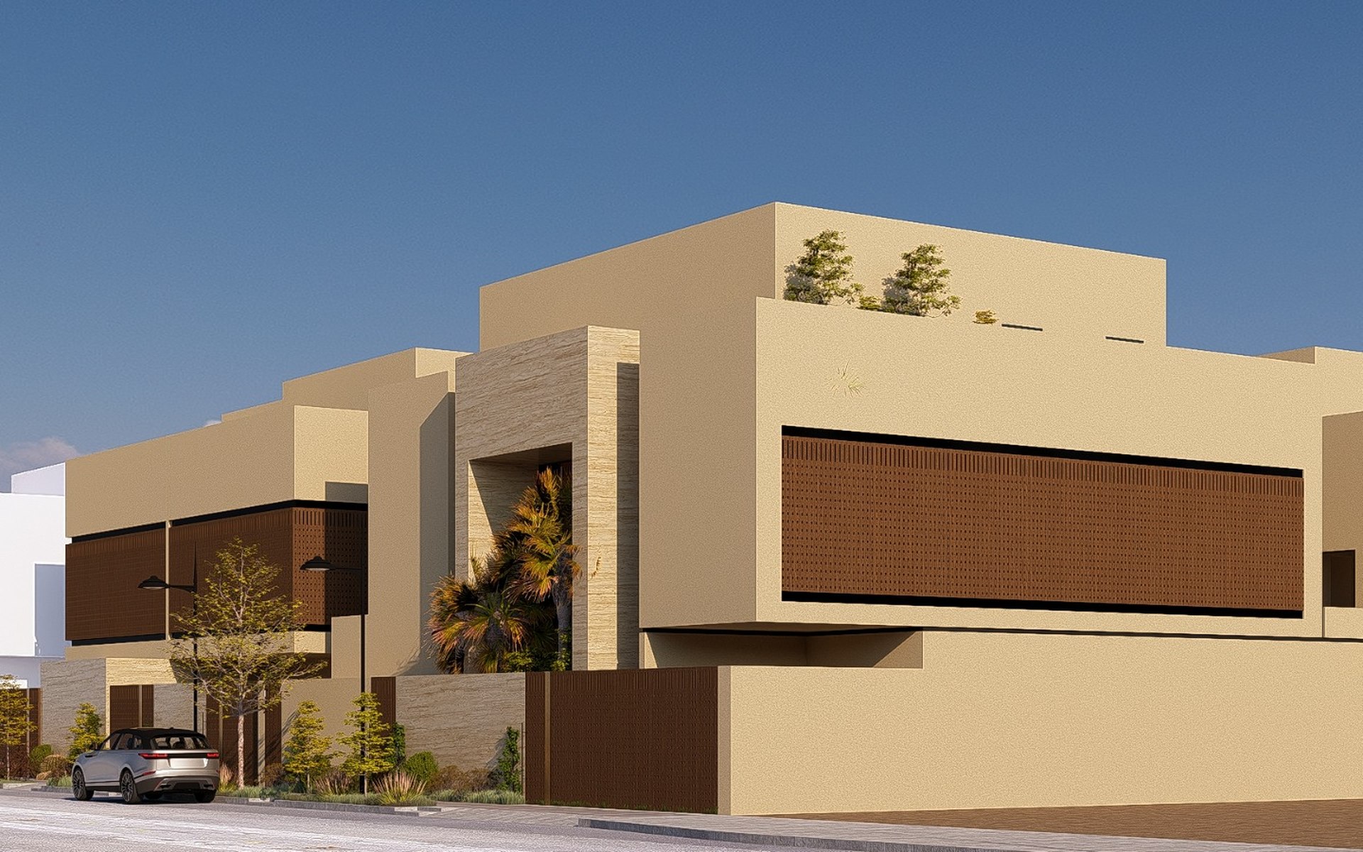 Alurean One — a daytime three-quarter view of the corner residential mass with bronze perforated screening